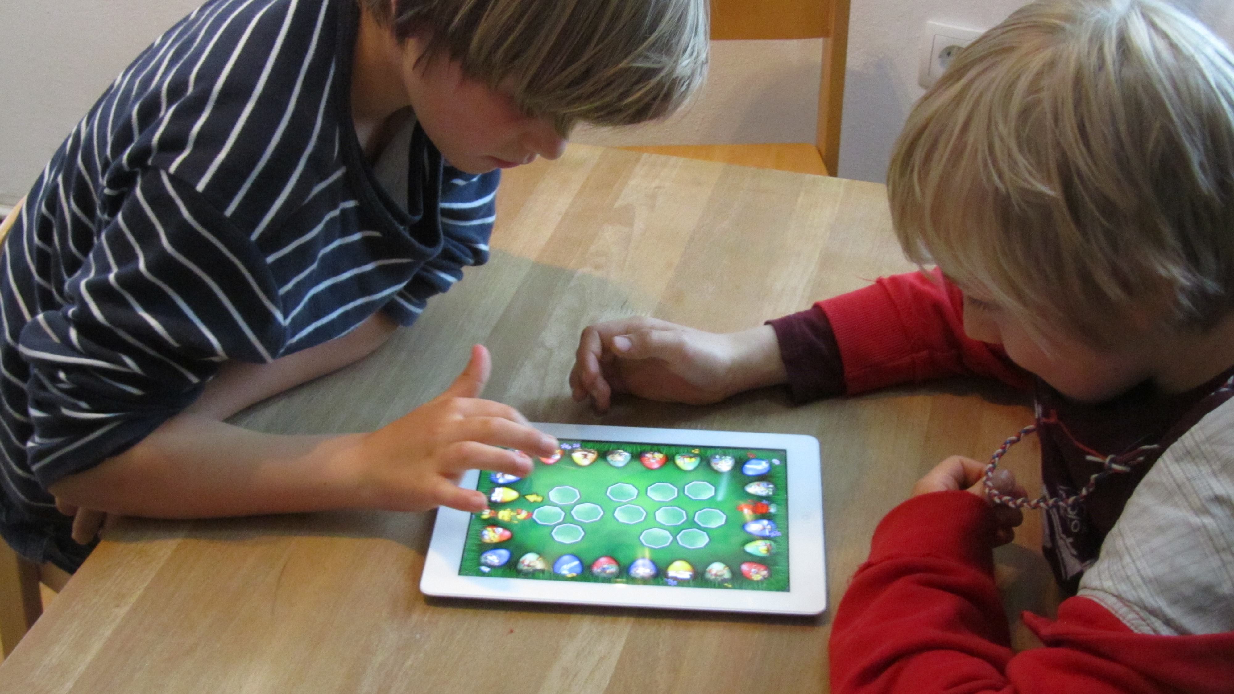 wo kids enjoying the memory skill based chicken chase!